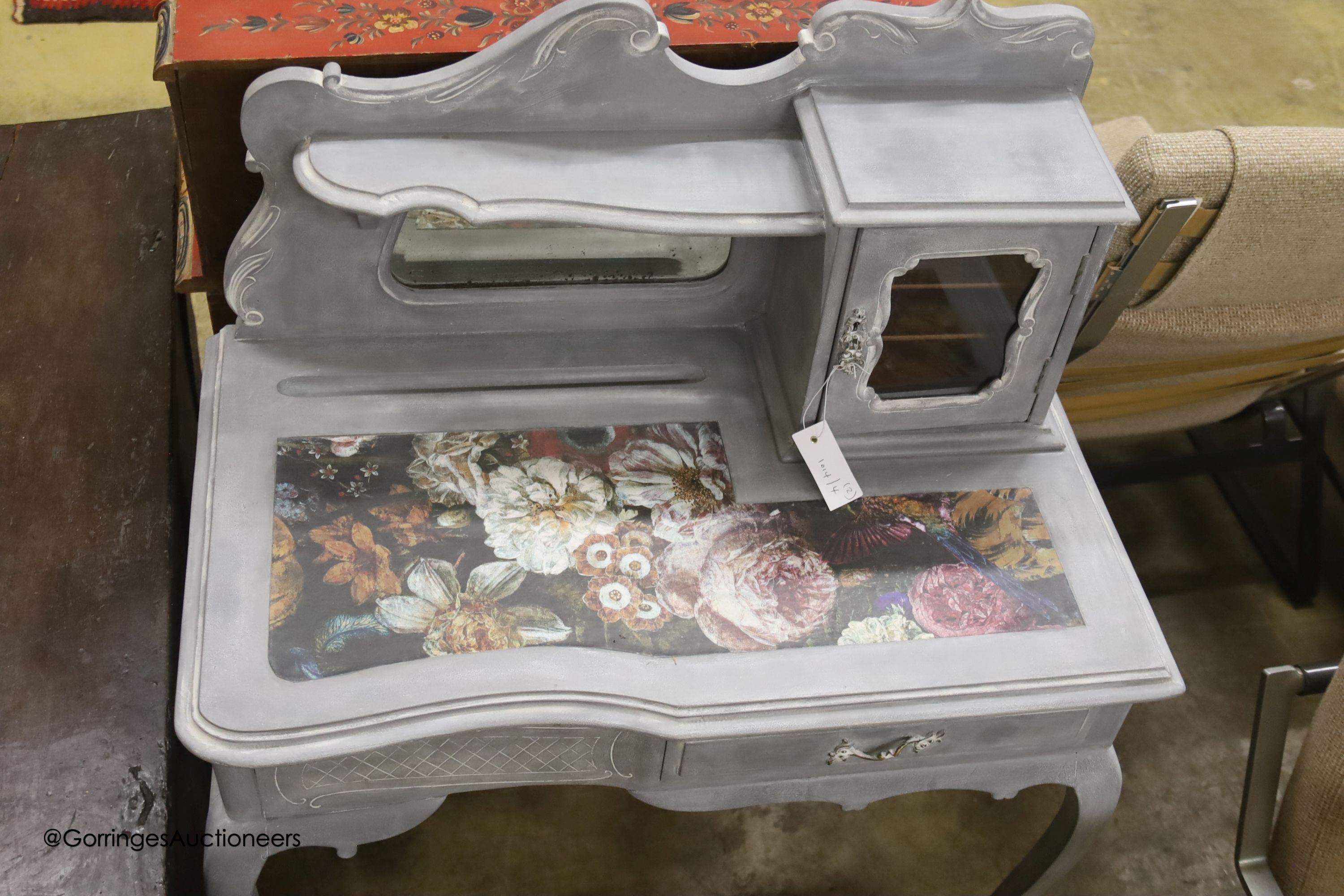 A Victorian later painted dressing table, width 75cm, depth 44cm, height 106cm together with a decoupage wall mirror